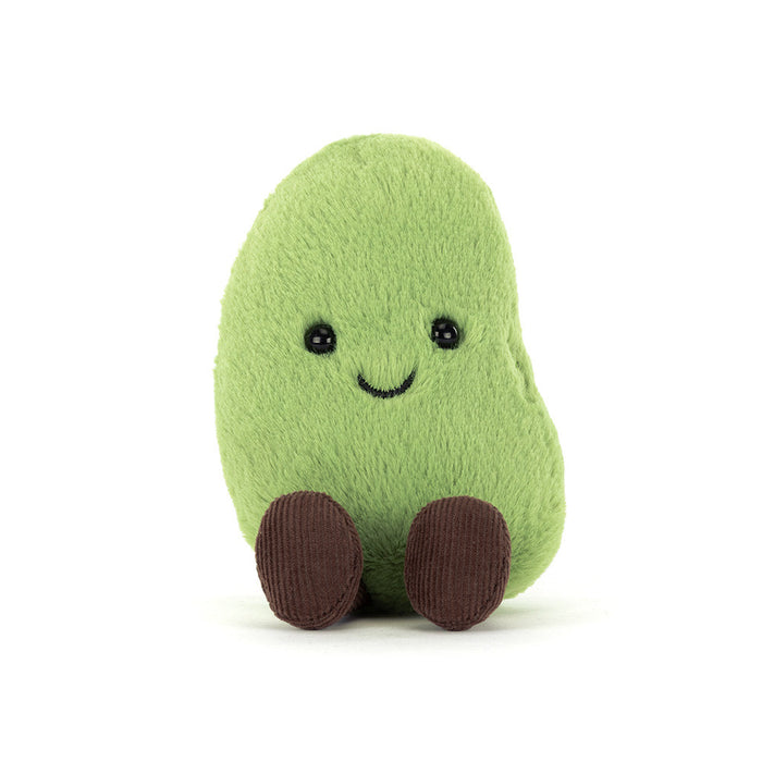 Green edamame toy with a smiling face on a white background