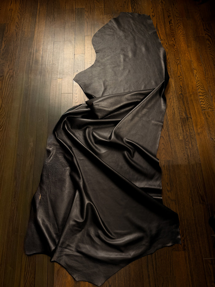 Black Full-Aniline Cowhide detail view showing color and natural variation