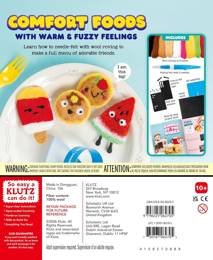 Back of a Comfort Foods Wool Roving kit package, showing a plate of cheese sticks with cartoon faces, a yellow fork, a small inset of included items, and extensive product information, warnings, and barcode details on a white background.