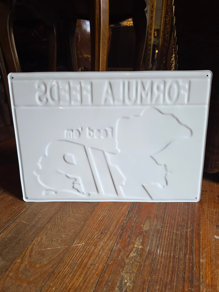 Formula Feeds metal sign