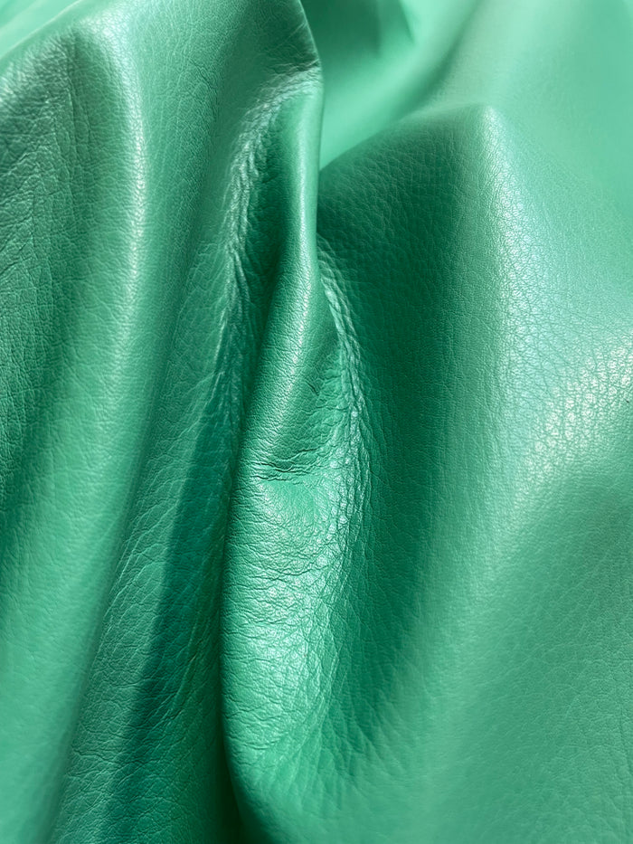 Close-up of Kelly Green Full-Aniline Cowhide showing grain, texture, and finish