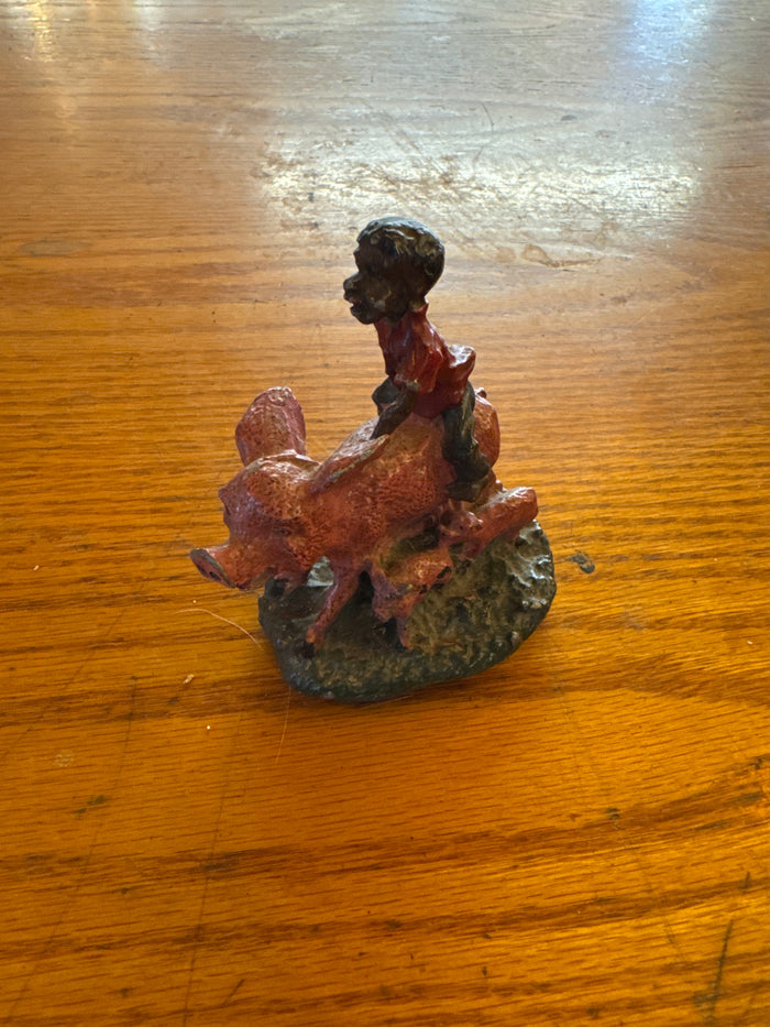 Lead Black Americana boy with pigs