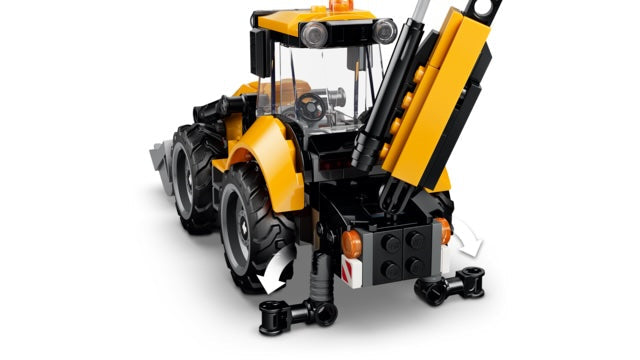 Toy construction vehicle model on a white background