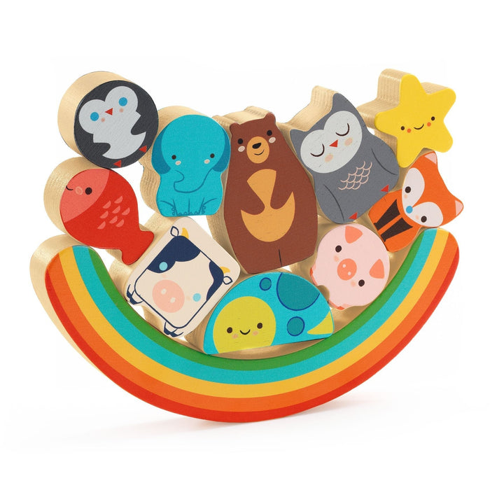 Stacked wooden puzzle with animal shapes on a rainbow on a white background
