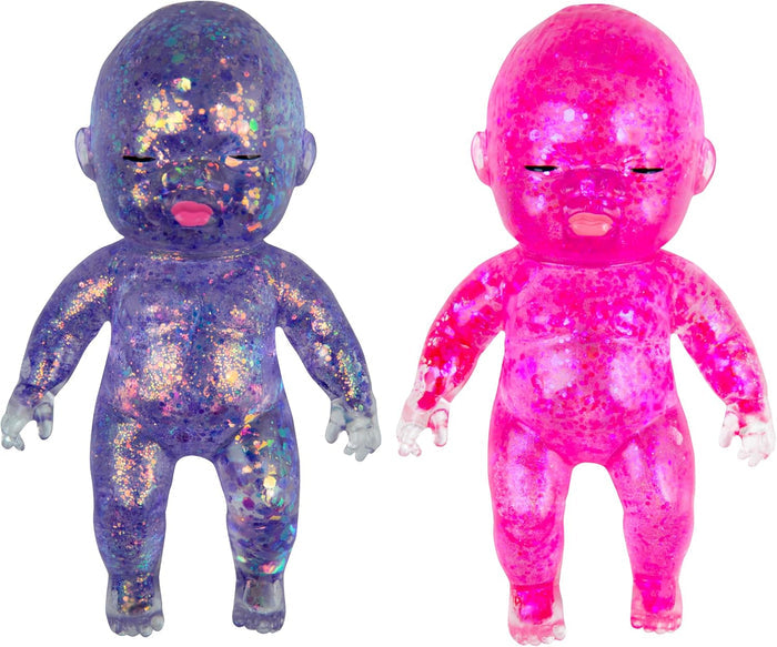 Two colorful squishy baby dolls, one purple and one pink, on a white background.