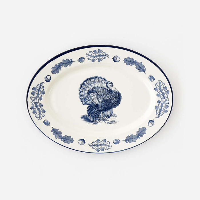 Turkey "Enamel" Oval Platter featuring a detailed turkey design with oak leaves on a classic blue-and-white background.