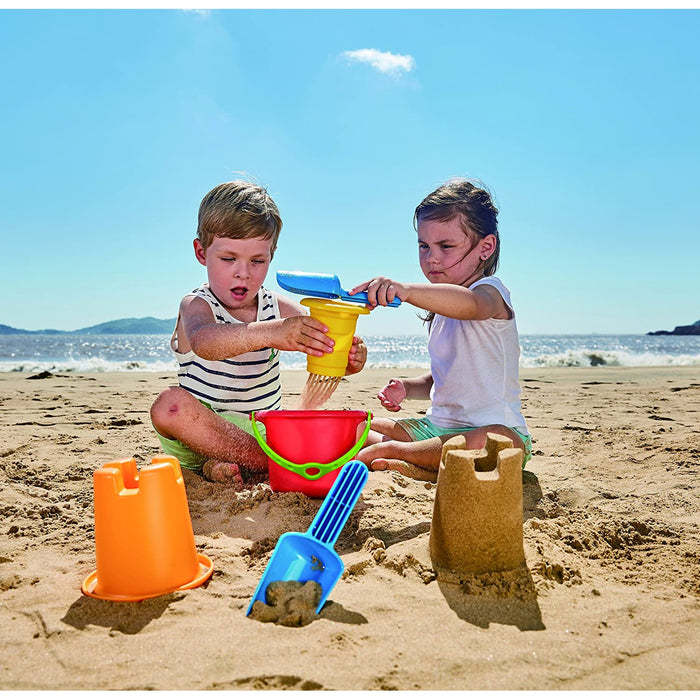 Children on the beach playing with Happy Buckets beach set.