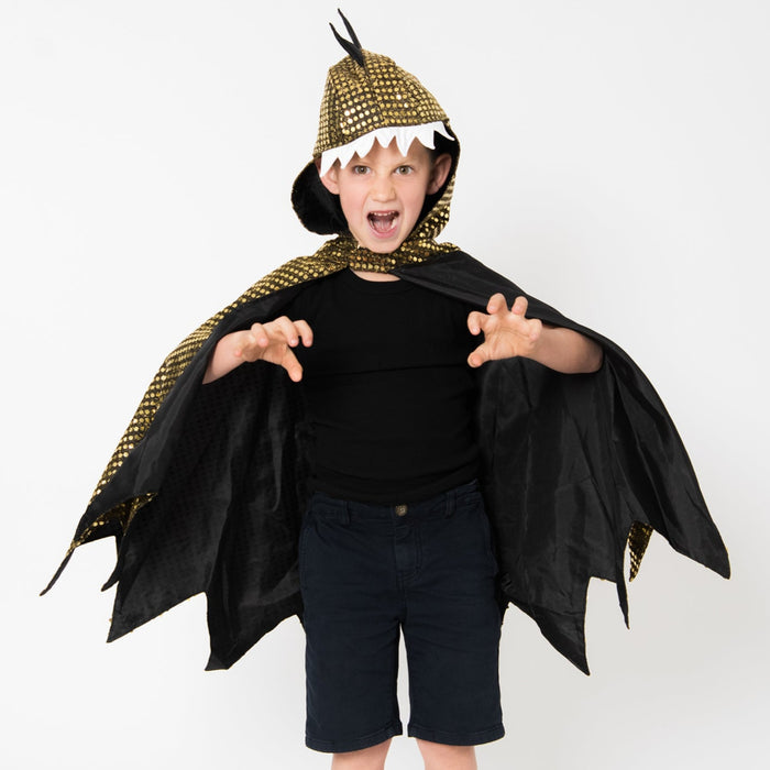 boy in a lucky dragon cape