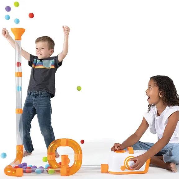 Kids playing with Airtoobz on a white background