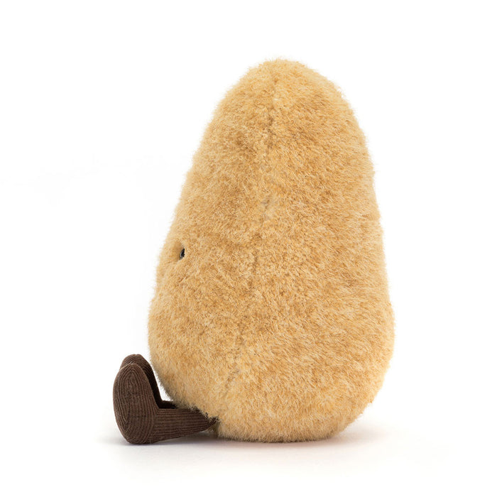 Plush potato toy with brown feet on a white background