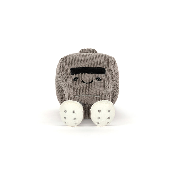 Front view of a plush grey sports whistle with a smiling face, gray body, and white feet on a white background