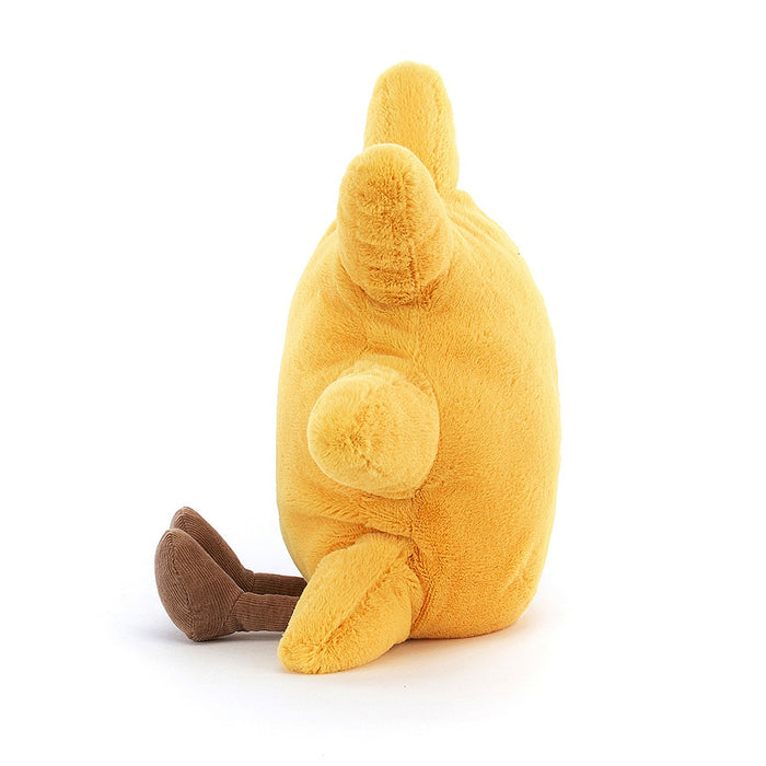 Side view of a plush sun on a white background.