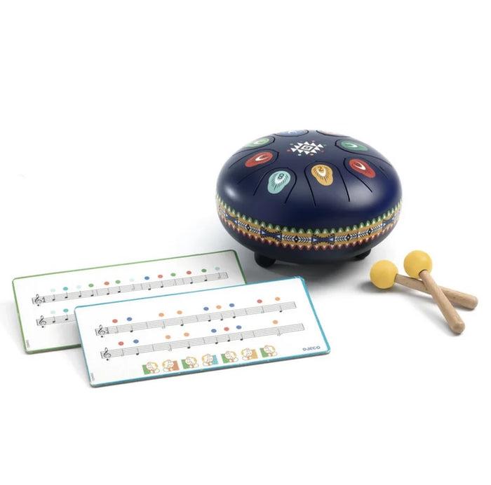 Blue Steel Tongue Drum with two mallets and musical note cards on a white background