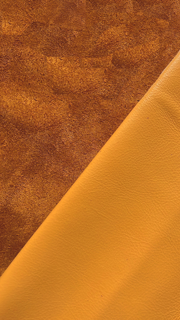 Close-up of Apricot Full-Aniline Cowhide showing grain, texture, and finish