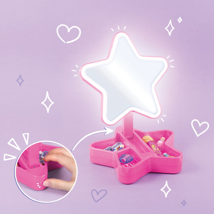 Glam Cosmetic Studio mirror illuminated on a purple background with hearts and diamonds