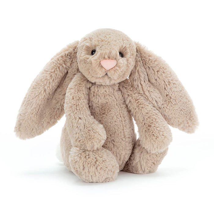Plush bunny toy on a white background