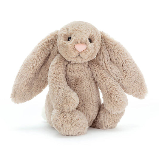 Plush bunny toy on a white background
