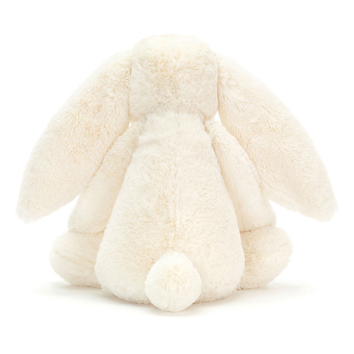 White plush bunny toy on a white background
