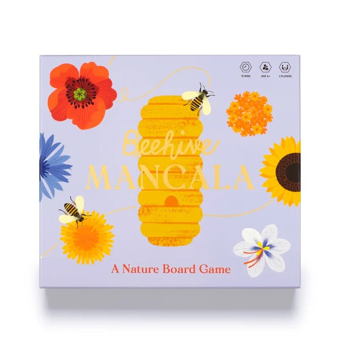 Box of 'Beehive Mancala' nature board game with floral designs on a light purple background