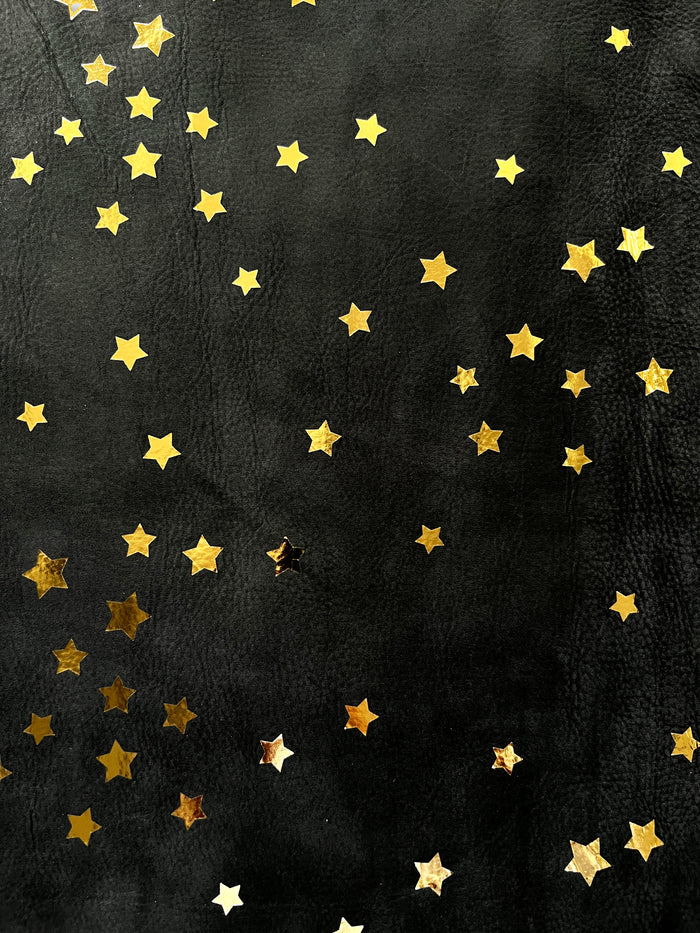 Black Gold Star Nubuck Cowhide close view showing grain and texture