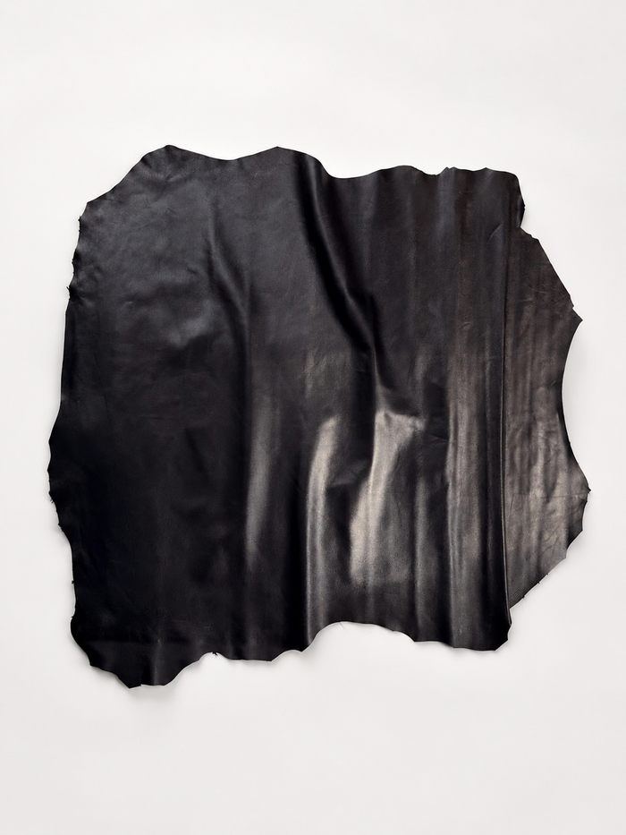 Black Italian Nappa Lambskin arranged in a flat lay to show color and surface finish
