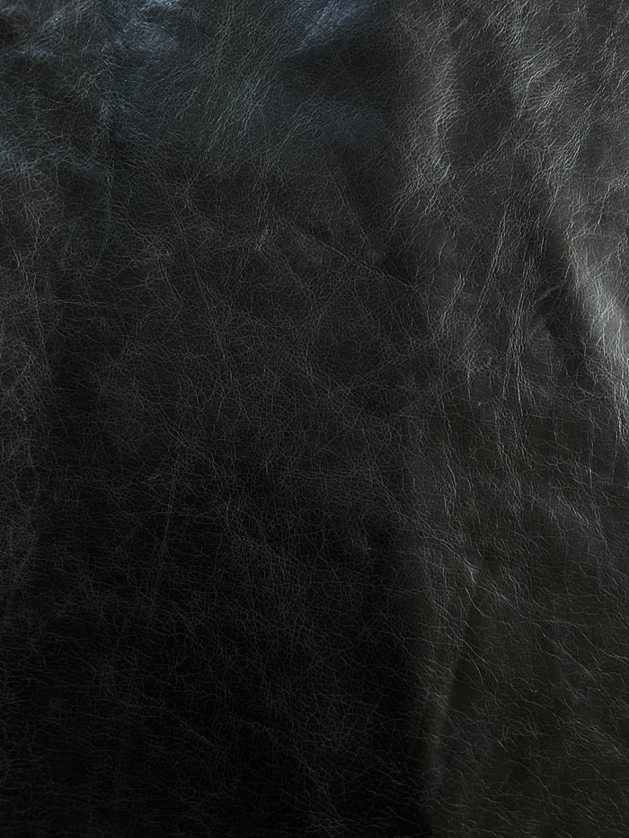Black Pull-Up Cowhide close view showing grain and texture