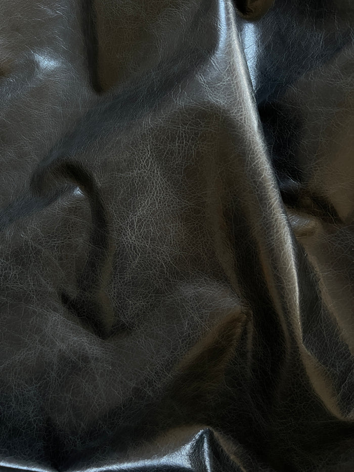 Black Pull-Up Cowhide shown to display leather shape and cutting area
