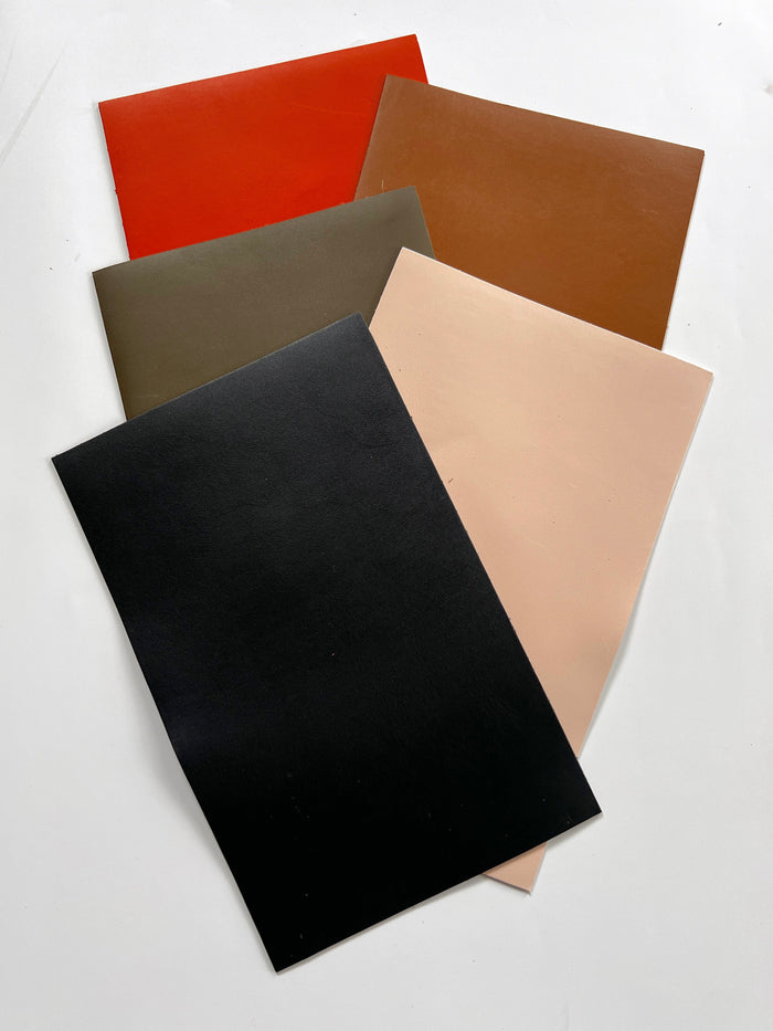 Smooth Italian calf leather sheet surface detail showing texture and finish