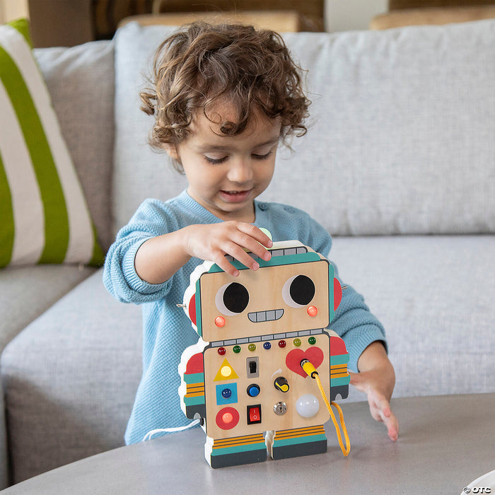 Child playing with  Blinity Bot in the living room.