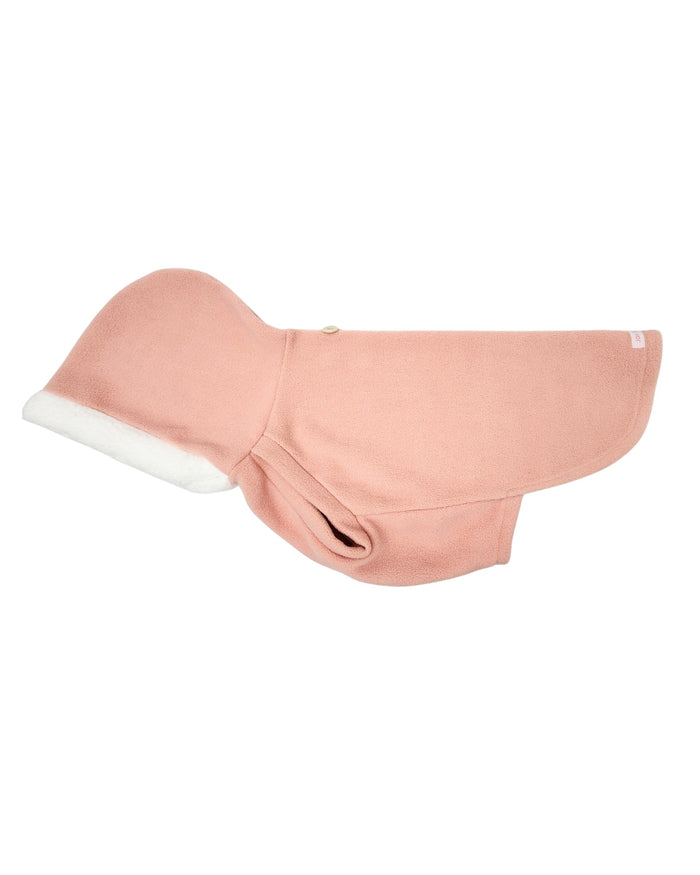 Blush pink fleece dog hoodie with sherpa trim and functional hood button, side view
