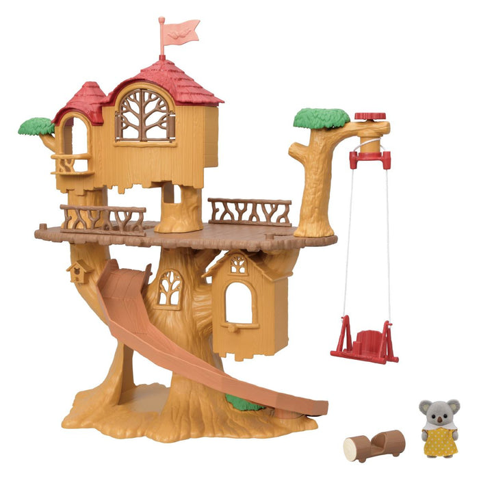 A toy treehouse playset with a tan and brown treehouse structure, red roof, slide, swing, small tree branch, and a small animal figure on a white background.