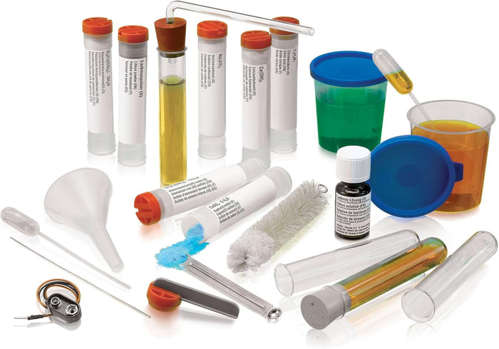 Collection of laboratory test tubes, containers, and tools on a white background