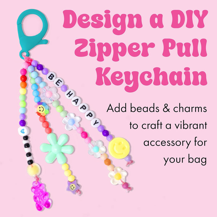 A bead and charm zipper pull keychain on a pink background