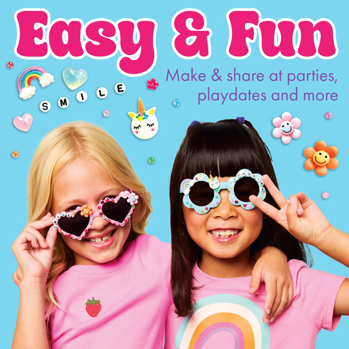 Two girls wearing designed Sunnies on a blue background.