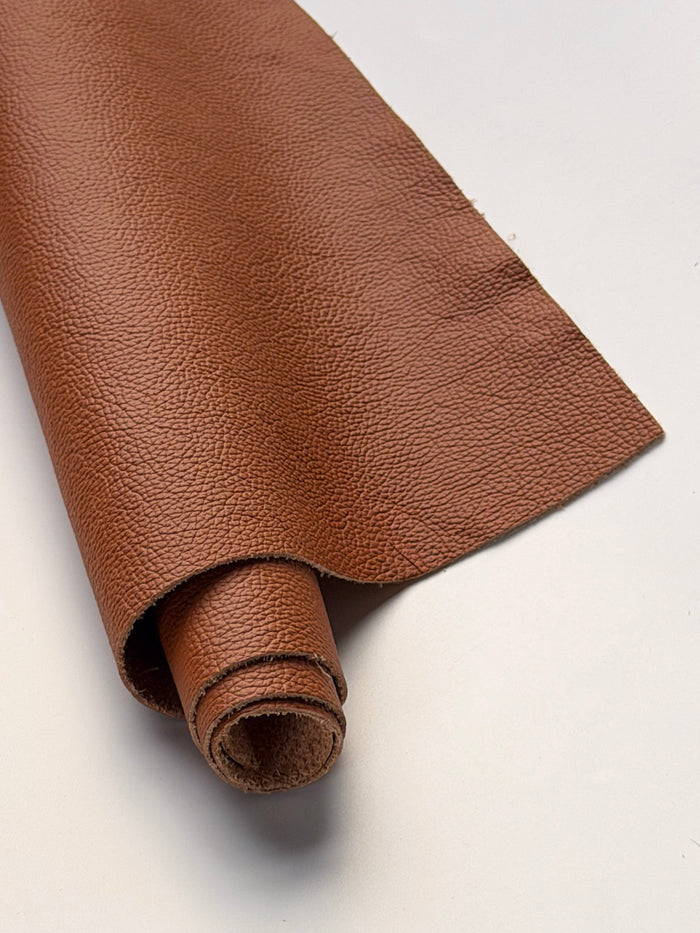 Cognac Upholstery Cowhide, 12 × 24 in close view showing grain and texture