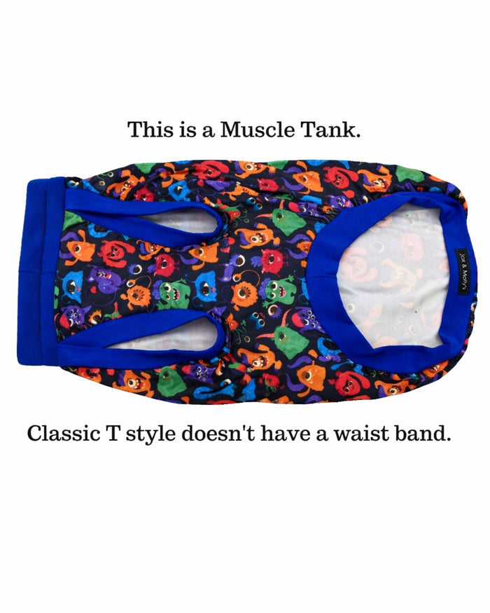 Colorful Monster Comrades dog pajamas underbelly view featuring vibrant monster print and pajama fit