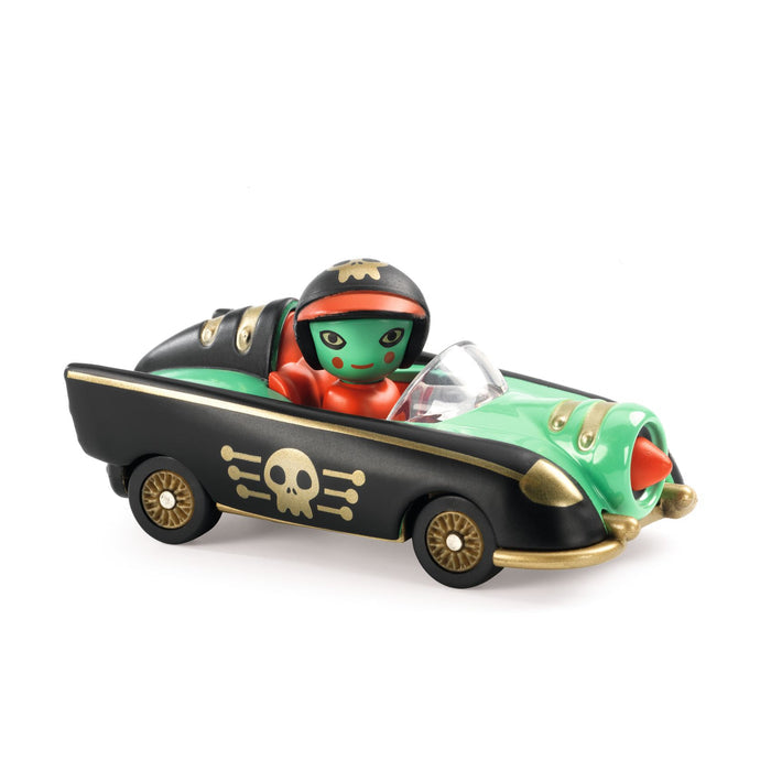 A miniature toy car with green and black body, a skull decal, and a rotating figure as the driver.