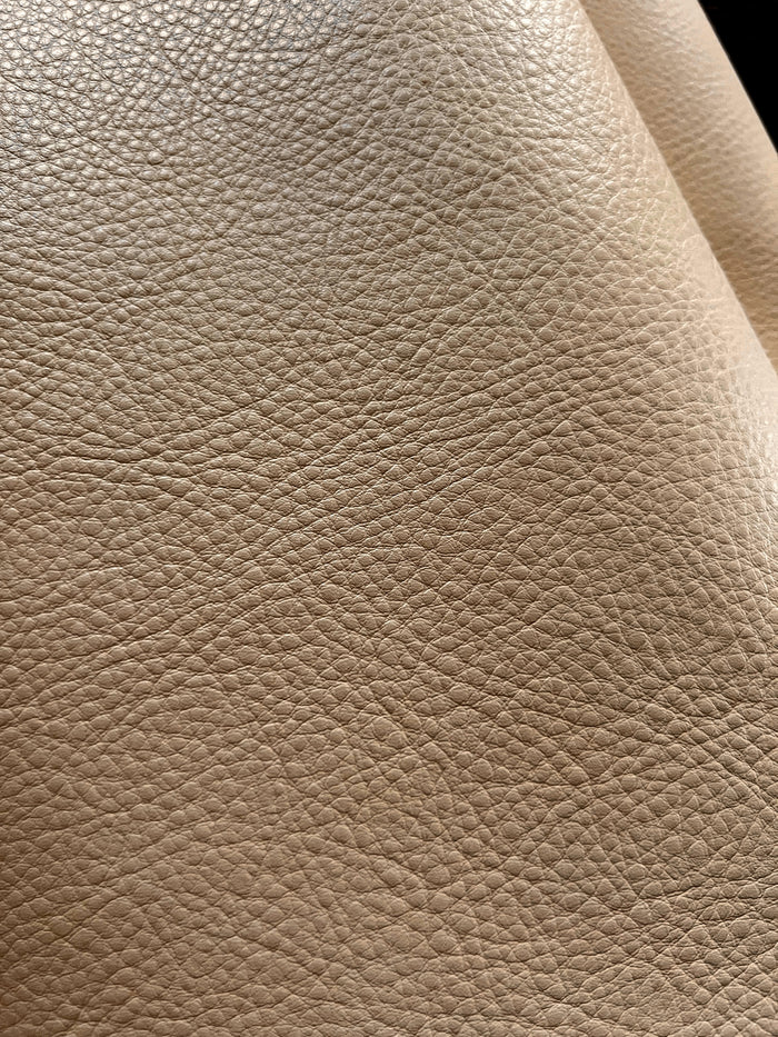Cream White Full-Aniline Cowhide shown to display leather shape and cutting area