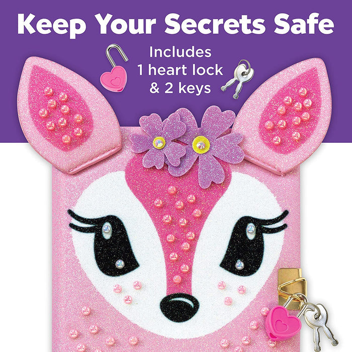 Close-up of a completed Deer Diary with a heart lock and two keys on a white and purple background
