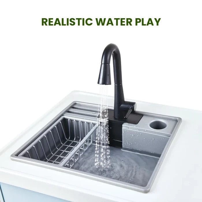 A modern single-basin kitchen sink with a matte black gooseneck faucet spraying water, shown on a white countertop with the text 'REALISTIC WATER PLAY' above.