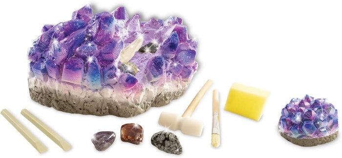 Colorful Giant Gem with tools on a white backfround.
