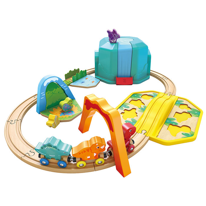 A colorful dinosaur train set with multiple pieces including dinosaurs, tracks, and interactive elements like a volcano and waterfall.