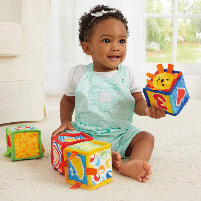 Child playing with colorful blocks in a bright room