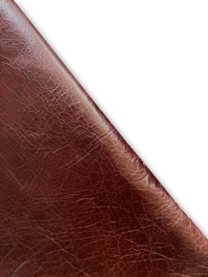 Saddle-style distressed cowhide shown to display leather shape and cutting area