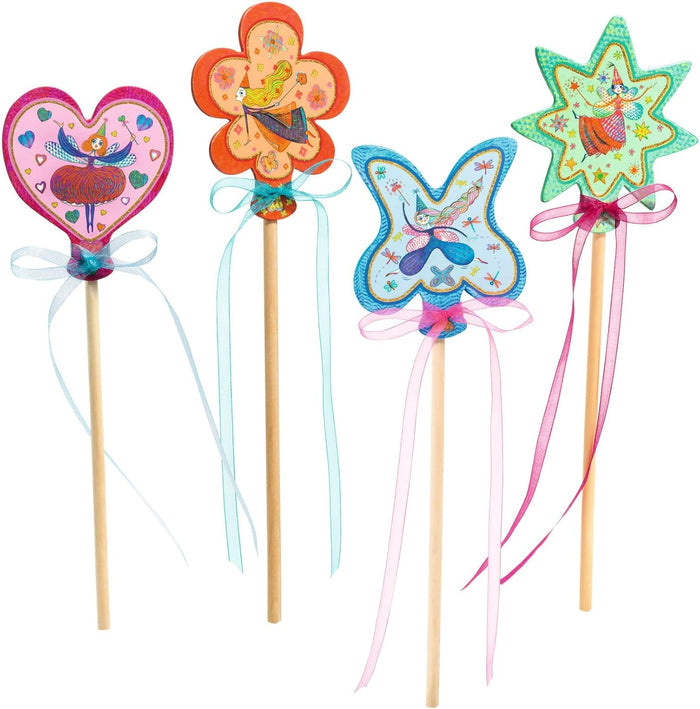 Four colorful wands on a white background