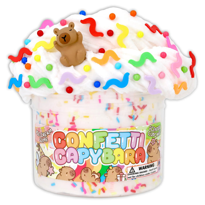 A colorful container of 'Confetti Capybara' white slime topped with themed capybara axolotl charm and sprinkles.