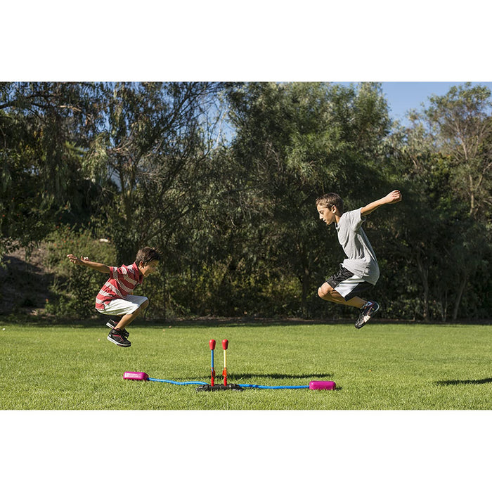 Two kids playing outdoors with Dueling Stomp Rockets.