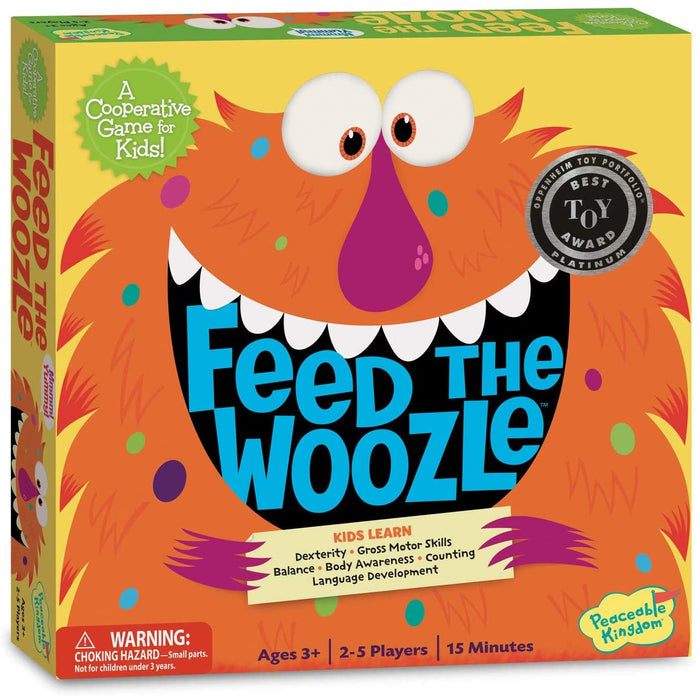 Board game box for 'Feed the Woozle' with colorful monster design and toy award badge.