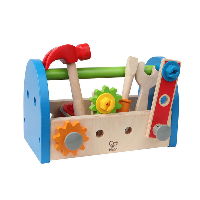 Colorful toy tool box with tools on a white background