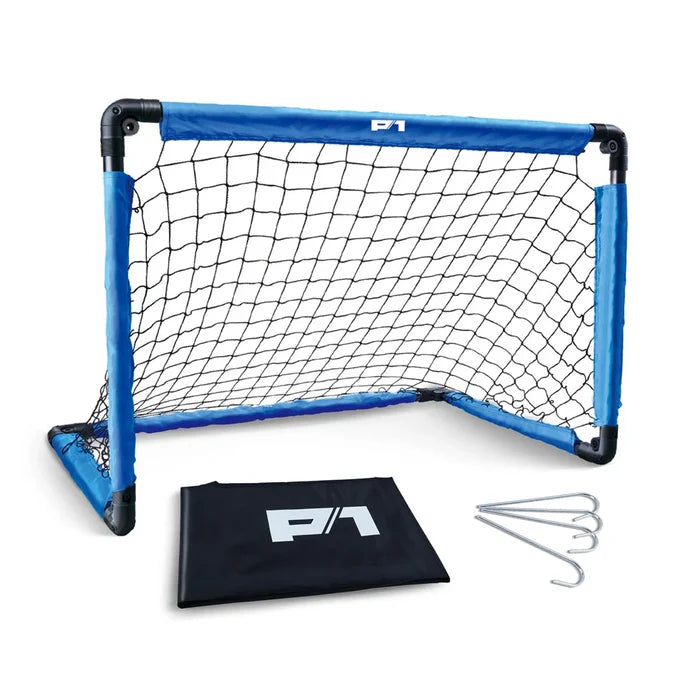 Blue soccer goal with black net, black carrying bag, and stakes on a white background